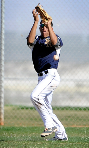 Shadow Ridge right fielder Eric Jordan drops a fly ball in the first inning on Monday agains ...