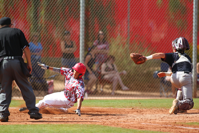 Arbor View’s Justin Rivera slides into home plate against Faith Lutheran on Saturday. ...