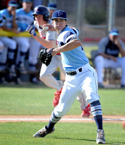 Foothill pitcher Nick Cardinale fires the ball to first to record an out on Monday. Cardinal ...