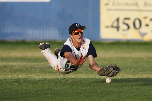Centennial’s Gino Sabey (12) is short of a catch against Chatsworth in their baseball ...