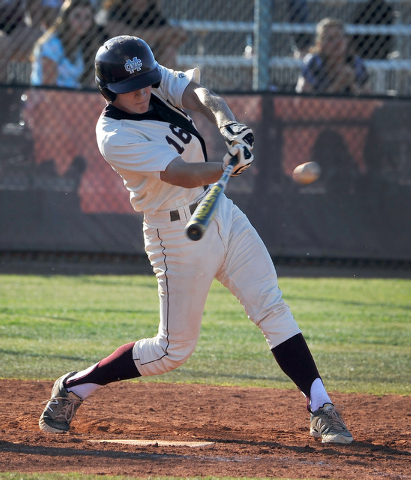 Cimarron’s Adam Mitchell swings away during the fifth inning against Bishop Gorman on ...