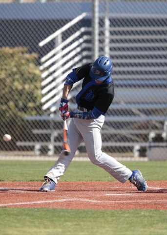 Basic High School senior Cory Wills (2) swings at the ball during a game against Centennial ...