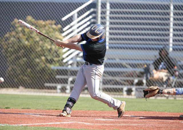 Basic High School sophomore Jack Wold (19) takes a wide swing during a game against Centenni ...