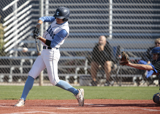 Centennial High School senior Zachary Dixon (3) hits the ball during a game agains Basic Hig ...