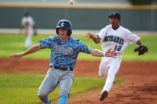 Centennial’s Ricky Koplow is caught in a rundown during the second inning Friday at Si ...