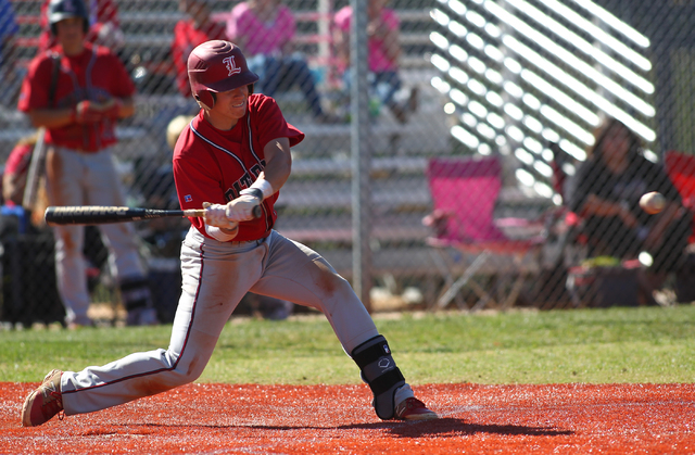 Liberty’s Nick Rush takes a hack against Spring Valley on Monday. The Patriots beat th ...