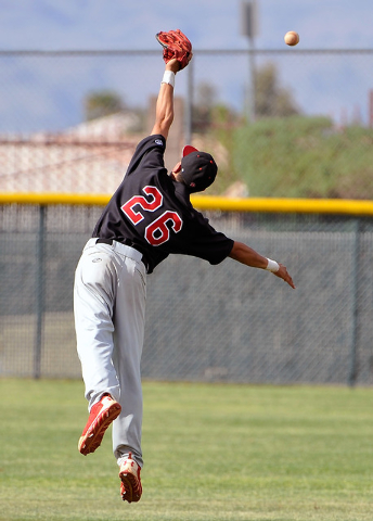 Las Vegas shortstop Hector Perez just misses a line drive against Shadow Ridge on Tuesday. L ...
