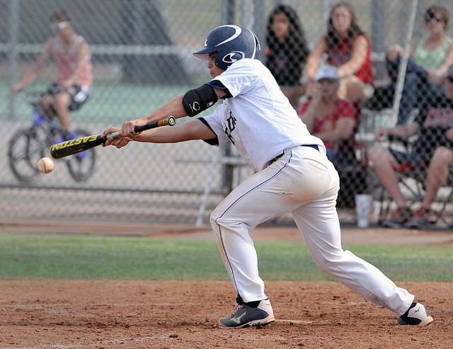 Shadow Ridge’s Jakob Chambers bunts the ball against Las Vegas High on Tuesday. Las Ve ...