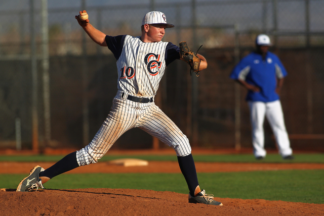Chatsworth’s Niko Switalla (10) fires a pitch against Basic during the seventh inning ...