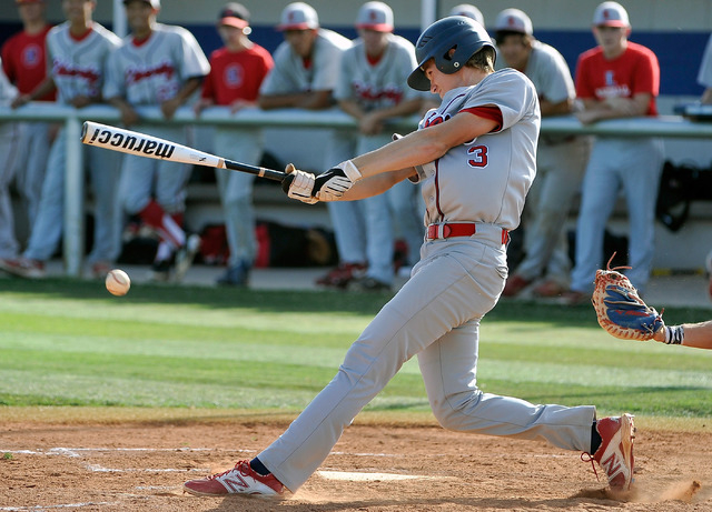 Liberty’s Trevor Mullaney connects with the ball during against Basic on Monday. Basic ...