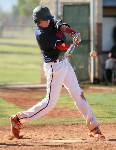 Liberty’s Jacob Rogers swings during a baseball game against Las Vegas at Liberty High ...