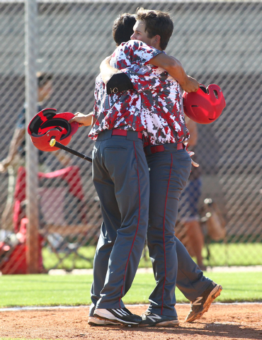 Arbor View’s Sid Cutting, right, celebrates his fourth-inning home run with teammate K ...