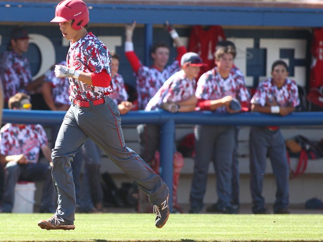 Arbor View’s Nick Quintana (12) heads for home plate after his solo homer in the first ...