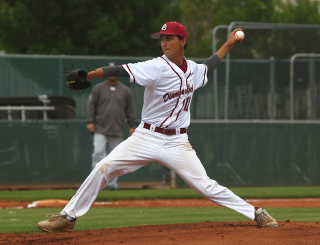 Desert Oasis’ Austin Strong (12) delivers a pitch in Saturday’s game against Spr ...