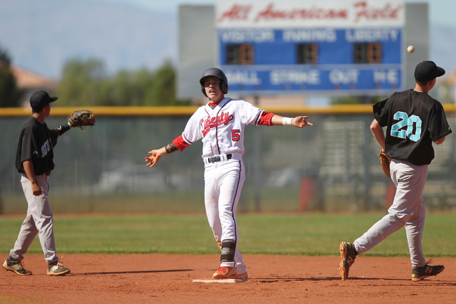 Liberty’s Nick Rush (5) celebrates a double in the first inning against Silverado in t ...