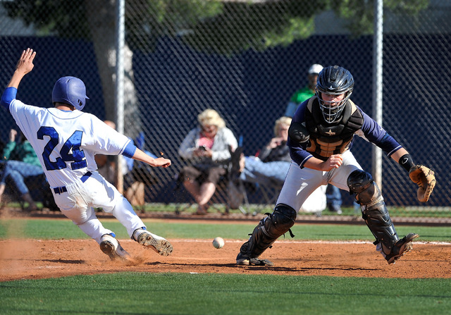 Sierra Vista’s Matthew Almaguer (24) slides safely home to score a run during the sixt ...