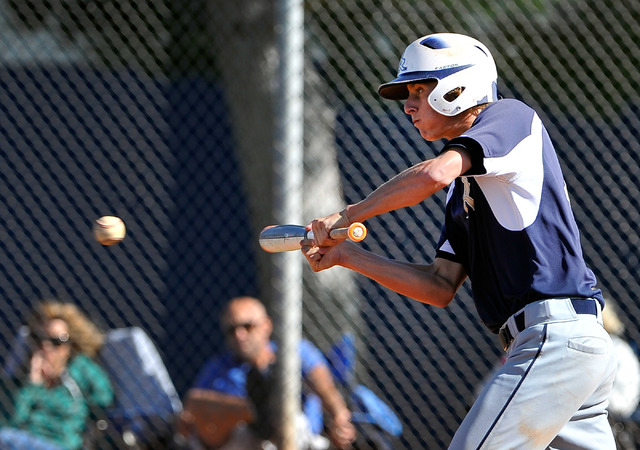 Shadow Ridges’s Travis Caskie bunts into an inning-ending double play in the fourth in ...