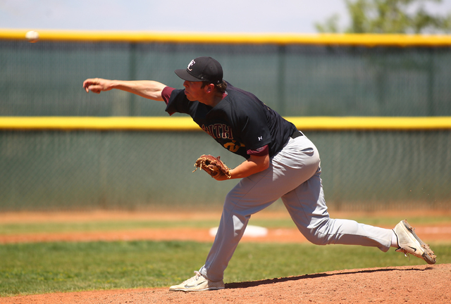 Faith Lutheran’s Brandon Johnson fires a pitch during Saturday’s game. Johnson a ...