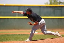 Faith Lutheran’s Brandon Johnson fires a pitch during Saturday’s game. Johnson a ...