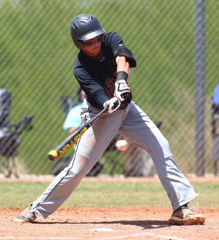 Faith Lutheran’s Zach Trageton (11) takes a swing during Saturday’s game at Coro ...