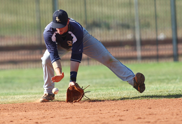Shadow Ridge’s Brady Hoskins fields a grounder while playing against Palo Verde on Thu ...