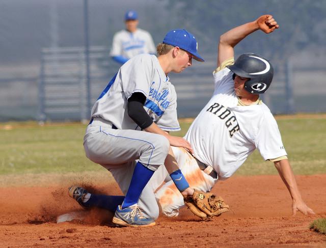 Shadow Ridge’s Jacob Chambers slides safely into second while Sierra Vista’s Cha ...