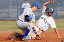 Shadow Ridge’s Jacob Chambers slides safely into second while Sierra Vista’s Cha ...