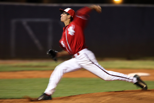 Arbor View pitcher Ben Cutting throws to Green Valley during their Division I baseball game ...