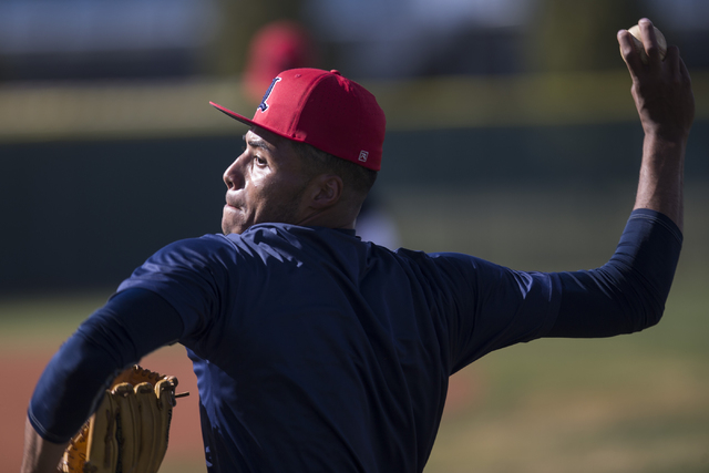 Liberty’s senior Ed O’Bannon throws the ball during a team practice at Liberty H ...