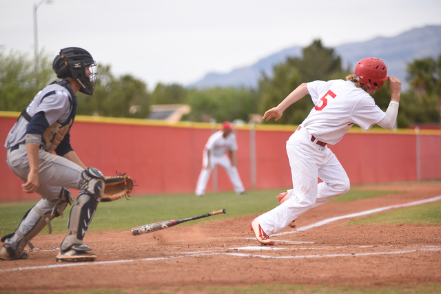 Arbor View’s Brandon Stevens (5) runs to first base after a hit against Shadow Ridge d ...