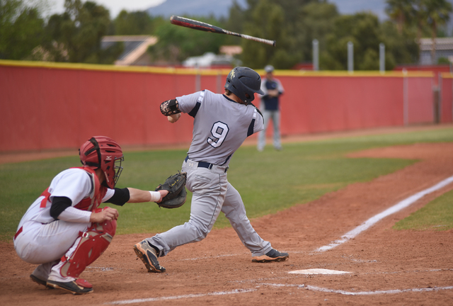 Shadow Ridge’s Justin Lee (9) loses his bat after swinging at a pitch against Arbor Vi ...