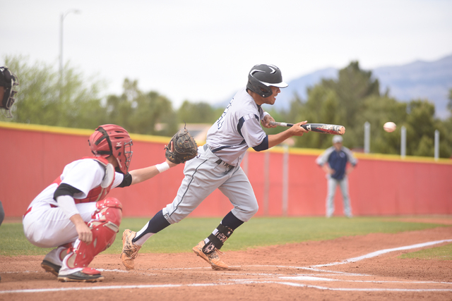 Shadow Ridge’s Eric Jordan (21) attempts a bunt against Arbor View during their baseba ...