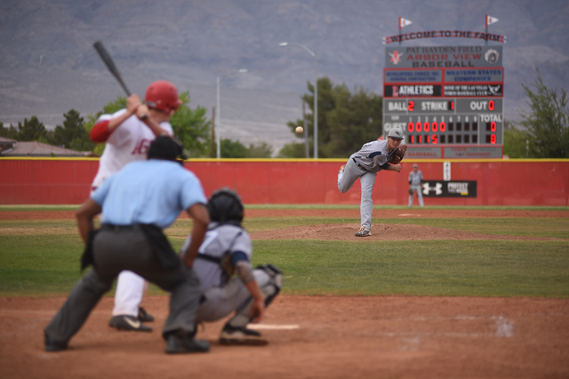 Shadow Ridge’s Jesse Meyer (14) pitches against Arbor View during their baseball game ...