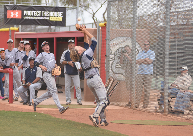 Shadow Ridge’s Kyle Gaura (17) catches a foul ball for an out against Arbor View durin ...