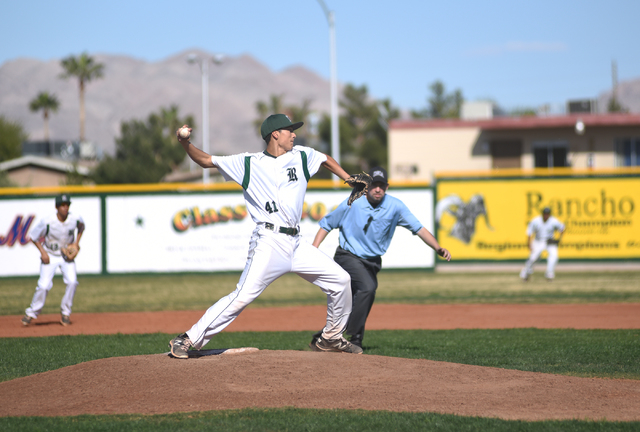 Rancho’s Layton Walls (41) throws to first base attempting to get the runner out again ...