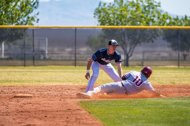 Shadow Ridge second baseman Isaiah Blaylock tags Desert Oasis infielder Bryson Scott out at ...