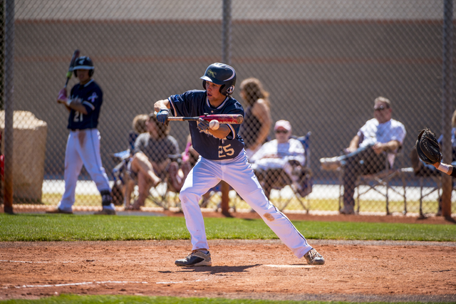 Shadow Ridge outfielder Koby Millner bunts against Desert Oasis at Shadow Ridge High School ...