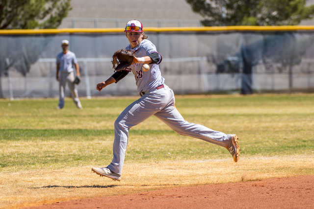 Desert Oasis shortstop Bryson Scott chases down a ball against Shadow Ridge at Shadow Ridge ...