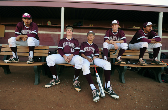 Cimarron-Memorial players are seen in the dugout in the seventh inning of their prep basebal ...