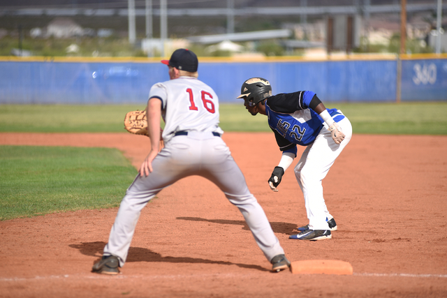 Basic’s J.J. Smith (22) position’s himself to steal 2nd base against LibertyR ...