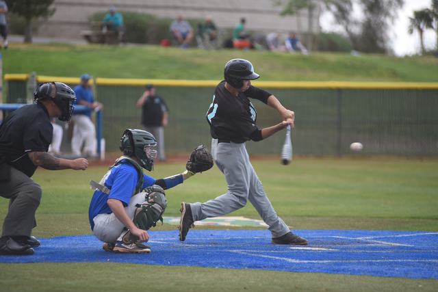 Silverado’s Dax Fellows (11) swings at a pitch against Green Valley during their baseb ...