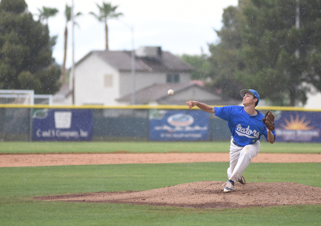 Green Valley’s Justin Caputo (4) pitches against Silverado during their baseball game ...