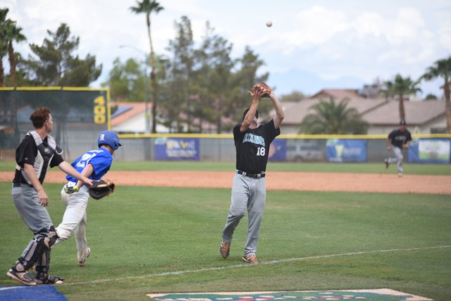 Silverado’s Ryan Pappas (18) catches a pop fly against Green Valley during their baseb ...