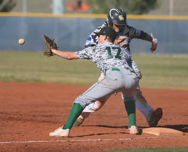 Palo Verde’s Austin Nilemo goes for a catch as Shadow Ridge’s Eric Jordan return ...