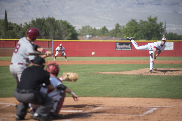 Arbor View’s Sam Pastrone (8) pitches to Desert Oasis Chase Adams (8) during their bas ...