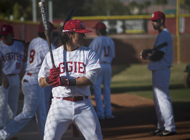 Arbor View’s Nick Quintana (12) warms up during their game against Faith Lutheran at A ...