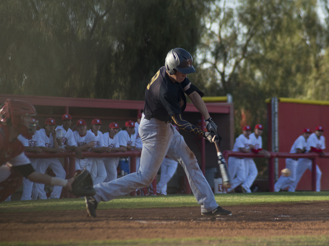 Faith Lutheran’s Brandon Davis (8) hits the ball during their game at Arbor View High ...