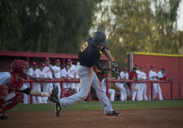 Faith Lutheran’s Brandon Davis (8) hits the ball during their game at Arbor View High ...