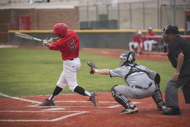 Las Vegas High School’s Ryan Freimuth (6) swings at a pitch during their baseball game ...