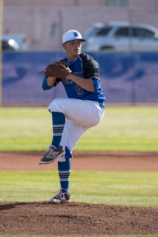 Basic pitcher CJ Dornak (9) pitches against Las Vegas High School at Basic High School in He ...